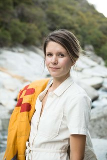 Laura Preston of Vacilando Quilting makes modern quilts inspired by travel out of her 34-foot Airstream trailer that she and her husband have been working, living, and traveling in since 2013.