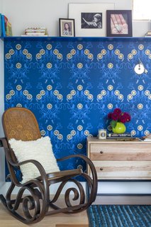Q&A With an Architect About What it's Like to Design Your Own Home - Photo 6 of 7 - The wallpaper used in the master bedroom is Captain Smith Promenade. An antique Thonet Bentwood Rocking Chair, which has been in the family for generations, sits in the corner of the room. 