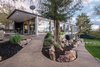 Modern home with Exterior, Mid-Century Building Type, Flat RoofLine, Glass Siding Material, and Wood Siding Material. Back Photo 4 of An Eduard Dreier Home asked $1.2M