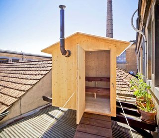 The stand-alone structure is made entirely from treated pine, while its corrugated polycarbonate roof protects it from the elements. 