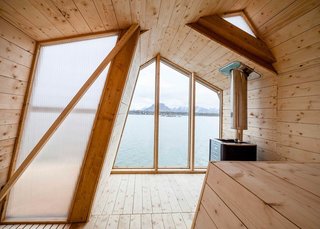 The ribbon-like design affords the building three different gabled roof profiles—one is symmetrical, while the other two lean in opposite directions.