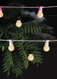 Though these rubber outdoor string lights by Seletti are no longer available, they may provide some inspiration for figuring out a similar effect in your outdoor space.