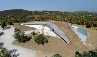 This Y-Shaped Greek Villa Looks Like a Flying Saucer That’s Embedded Into the Hills - Photo 1 of 8 -