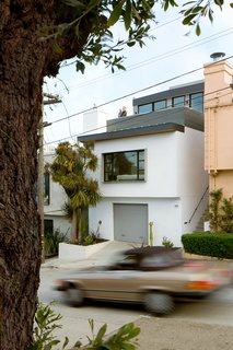 Revamping the San Francisco Vernacular, Modern Design and Technology Serves A Busy Family - Photo 1 of 7 - On the third story, a master suite and roof deck with city views were designed along with two bedrooms and a new bath.