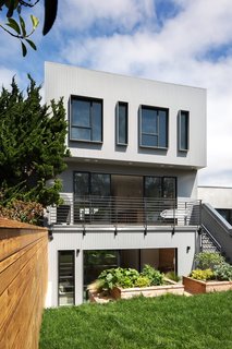 Revamping the San Francisco Vernacular, Modern Design and Technology Serves A Busy Family - Photo 2 of 7 - "With the two young kids commanding our schedule, we spend a lot of time around the house. Being able to completely open up the back of the house to the outside and back yard makes that time at home much more enjoyable and relaxing and completely takes care of the cabin fever we used to always feel in our old house," explains David 