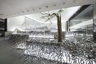 At a Japanese Flower Art School, Nendo Drapes an Ivy of Mirrors Over a Stone Garden by Isamu Noguchi - Photo 7 of 9 -