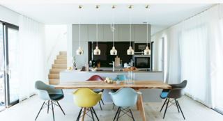 10 Modernist Beach Home Rentals to Escape to This Summer - Photo 9 of 10 - Located on the sandy dunes of the Baltic coast and just a short walk from the beach, the lodges are comprised of two newly-constructed (2016) "urban cool" wooden homes designed with clean-lined symmetry and a modern color scheme. Each lodge is outfitted with a custom interior and modern furniture by designers such as Minotti, Vitra, and Hans Wegner—along with contemporary art pieces and the latest in smart home technology. 