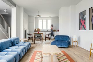 A Family’s Loft in Poland Gets a Minimalist Renovation That’s Both Elegant and Functional - Photo 1 of 12 -