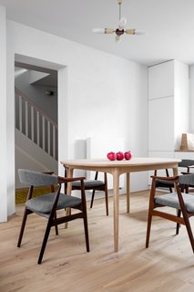 A Family’s Loft in Poland Gets a Minimalist Renovation That’s Both Elegant and Functional - Photo 6 of 12 -