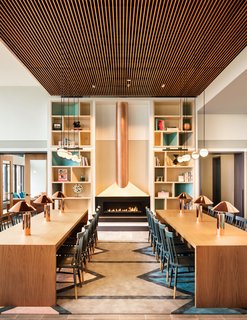 Tour a New Residential High-Rise That's Uniquely "Chicago" - Photo 4 of 11 - The Living Library is anchored by a copper fireplace.