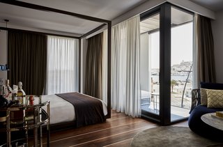 A New Hotel That Celebrates Ibiza's Maritime History and Love For Parties - Photo 5 of 11 -