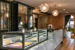 A candy counter greets hotel guests as a subtly elegant nod to the building's history. 