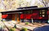 Modern home with Walkways, Front Yard, Flowers, Shrubs, Trees, Small Patio, Porch, Deck, Wood Patio, Porch, Deck, Decking Patio, Porch, Deck, Picture Window Type, Wood, Swing Door Type, Exterior, and Windows. Front Photo of The Ross-Yarger Project