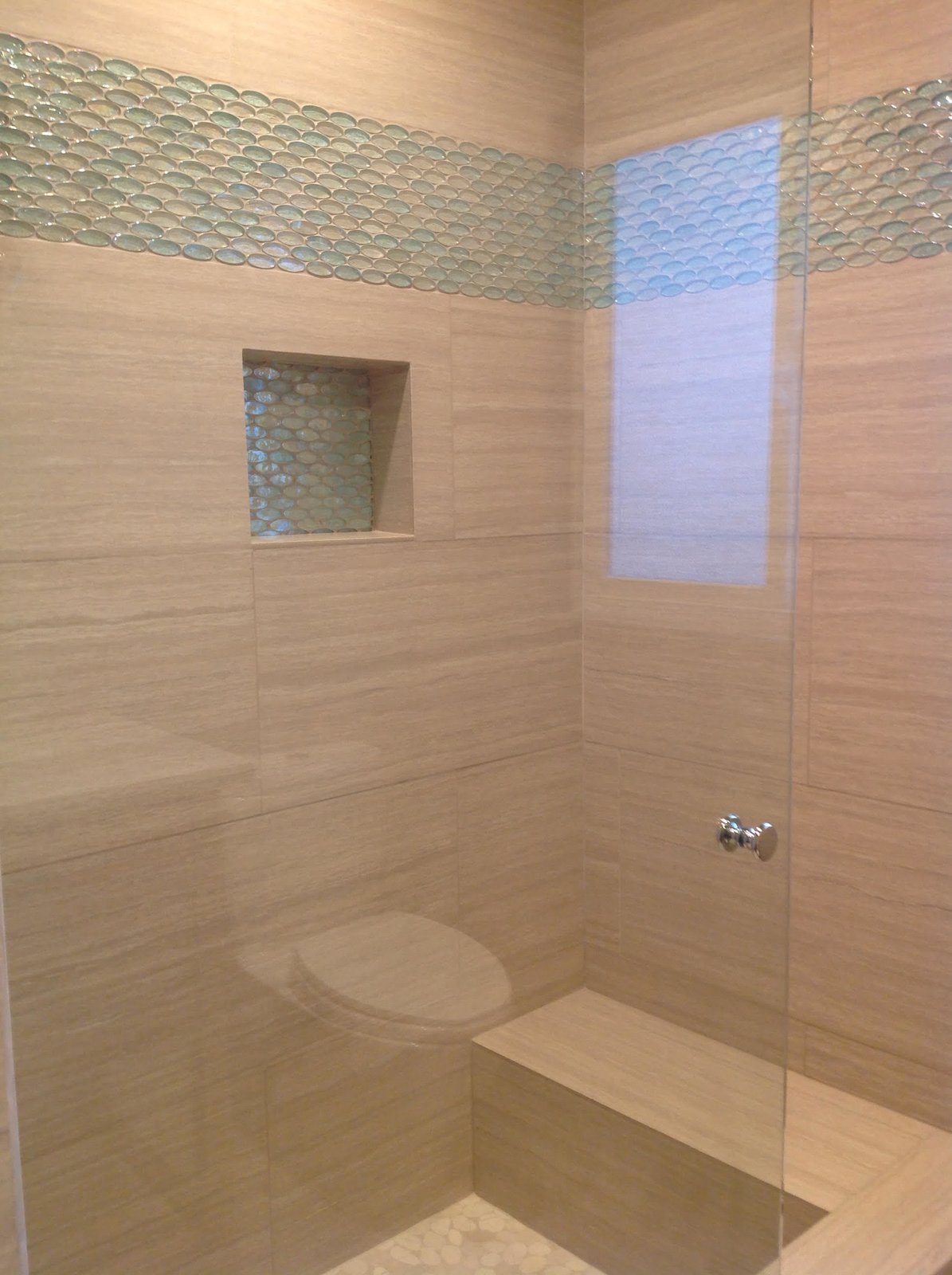 Photo 3 of 3 in Aqua and Clear Oval Glass Tile Bathroom Accent by Susan Jablon Dwell