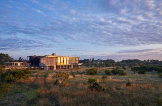 A 100-mile drive from the Big Apple, the 15-acre property in Orient, New York, serves as a vacation retreat and refuge for a Brooklyn couple.