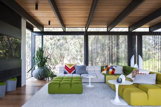 Unexpected Bursts of Color Enliven a Midcentury Pad in Australia