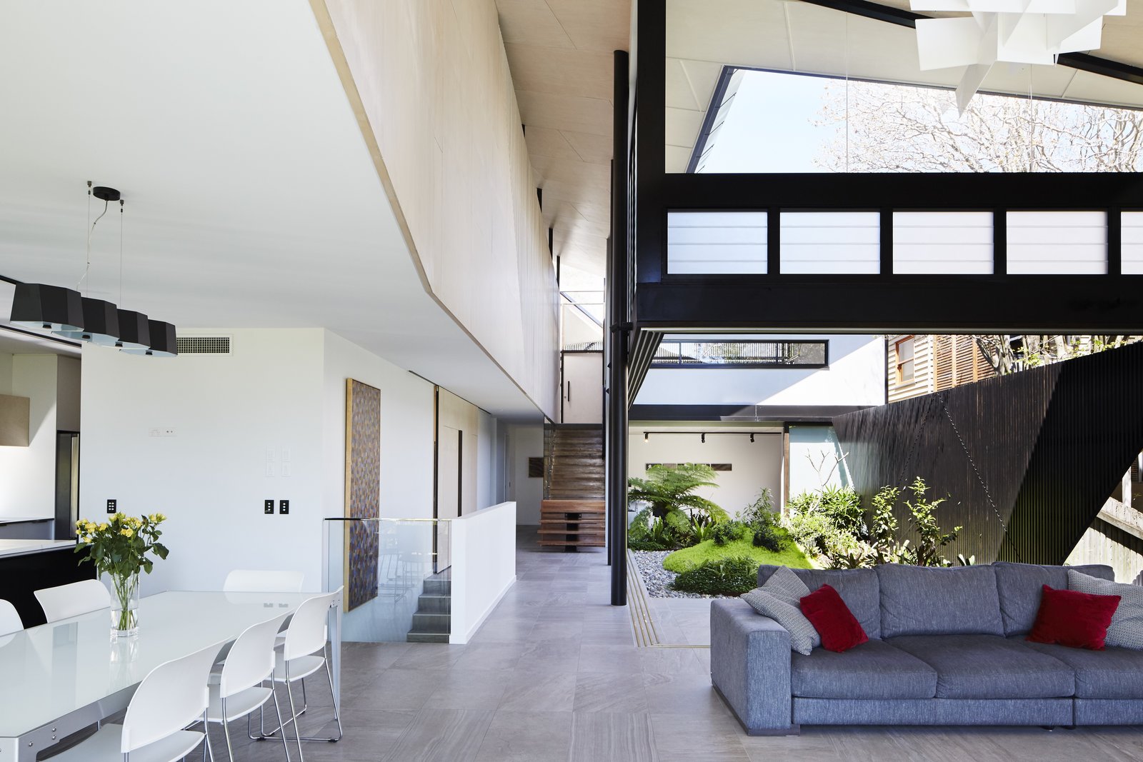 Photo 12 of 12 in An Edgy Slatted Facade Conceals a Striking Indoor ...