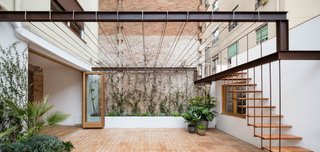 A Dramatic Apartment Renovation in Barcelona Features Salvaged Tile and Brick - Photo 12 of 13 -