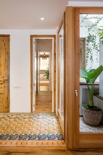 A Dramatic Apartment Renovation in Barcelona Features Salvaged Tile and Brick - Photo 9 of 13 -