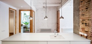 A Dramatic Apartment Renovation in Barcelona Features Salvaged Tile and Brick - Photo 5 of 13 -