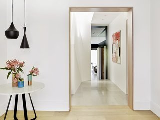 A Sleek, Two-Story Addition Hides Behind a Traditional Cottage in Sydney - Photo 3 of 12 -