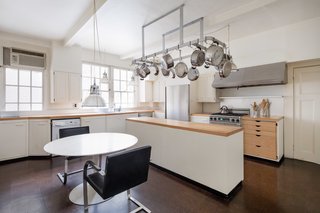 The eat-in kitchen with butcher block counters 