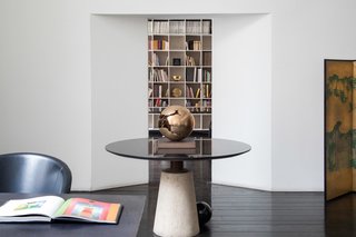 Their offices were side-by-side: his in the living room and hers adjacent, making for easy collaboration.