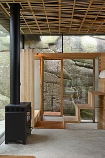 Oak steps lead to the loft bed.