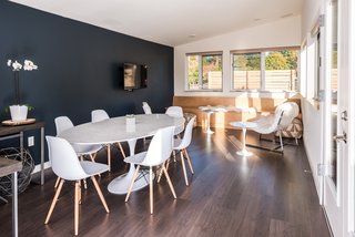 A Saarinen table and Eames chairs in the Public House are perfect for gathering morning or night.