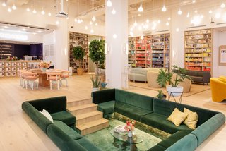 The heart of the space is the sunken velvet couch and conversation pit.