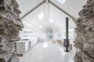 The public area of the home includes a kitchen, study, sitting room, and dining area.