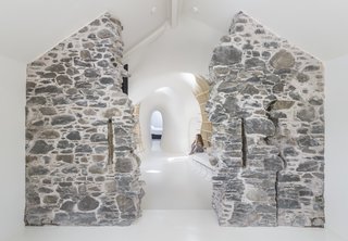 Passage through the home is shaped by irregularly sized doorways.