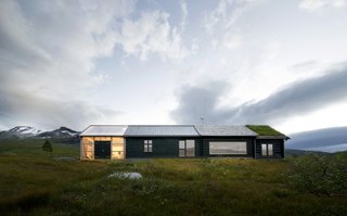 "In the western facade of the building the individual characters of the different units are most obvious, while in the eastern facade their coherence and the cabin as a whole is more prominent," write the architects.