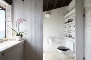 Bleached wood lightens up a bathroom.