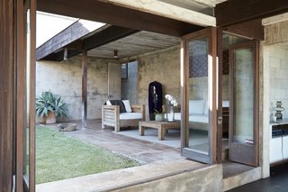 The lanai just off the living room is accessible to the kitchen.