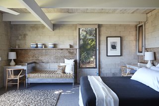 The principal bedroom also enjoys views of the water.