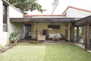 A view of the lanai with the kitchen behind it.
