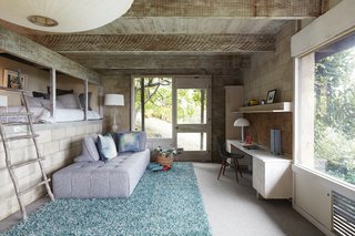 A children's room features a built-in bunk.