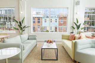 The pastel-colored couches echo the facades on the row houses lining the C&O Canal outside.