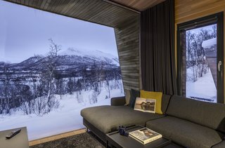 Expansive glass in every room ensures the natural site is always appreciated.