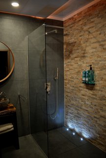 The Lodge includes a spa bathroom with a rain shower head.