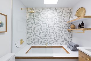 In the shower, handmade Bubble Hex tile from the Futura collection at the Portland–based company Clayhaus Tile makes a stunning statement. <br>