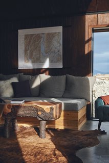 The built-in sofa was designed to be very functional. The base has storage capacity, and the mattress is the size of a single bed for an extra guest. Plus, industrial-grade foam and fabric ensure the cushions will hold up to wear and tear.