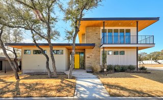 The Starlight is 2,007 square feet and wraps a courtyard. It includes three bedrooms, one of which is a separate master wing.