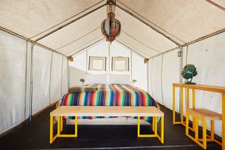 Here is a look at one of the 21 safari tents. Each one is 120 square feet and comes with wooden floors and durable canvas walls/doors.