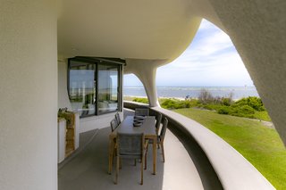 A generous 889 square feet of deck space wraps the back of the home.
