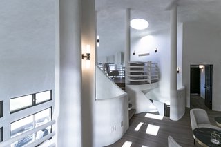 Organic curvatures shape interior walls.
