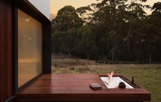 A tub inset in the deck fosters a true retreat experience.