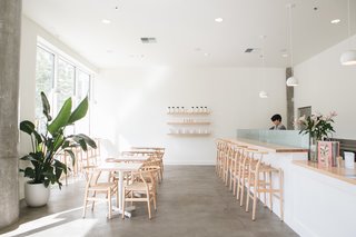 For Tea Bar, Swanson chose lighting from local outfit Schoolhouse Electric, including the Isaac Pendent.
