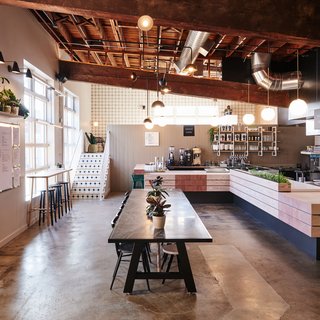 The communal table was designed by Bright Designlab and fabricated by Reed LaPlant.